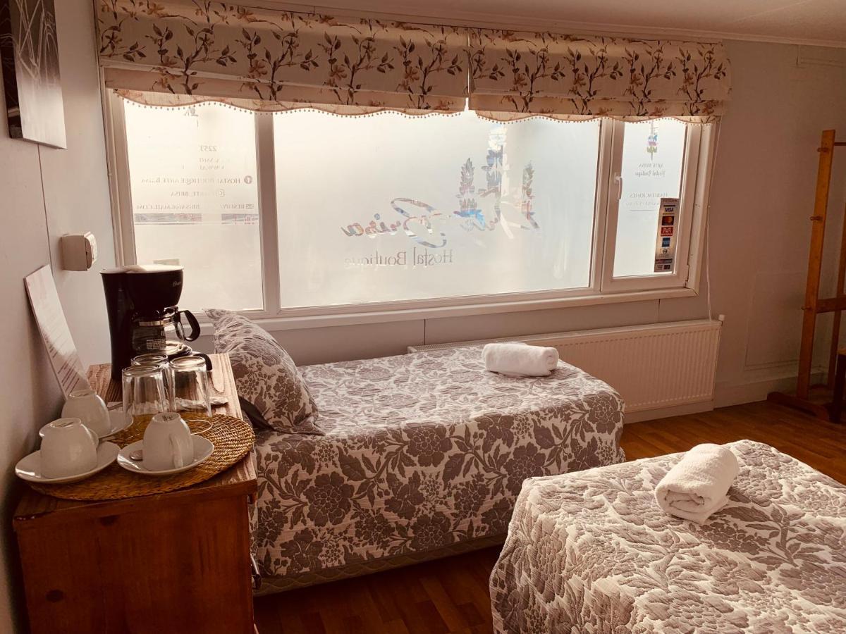 Arte Brisa Hostal Boutique Puerto Natales Bagian luar foto