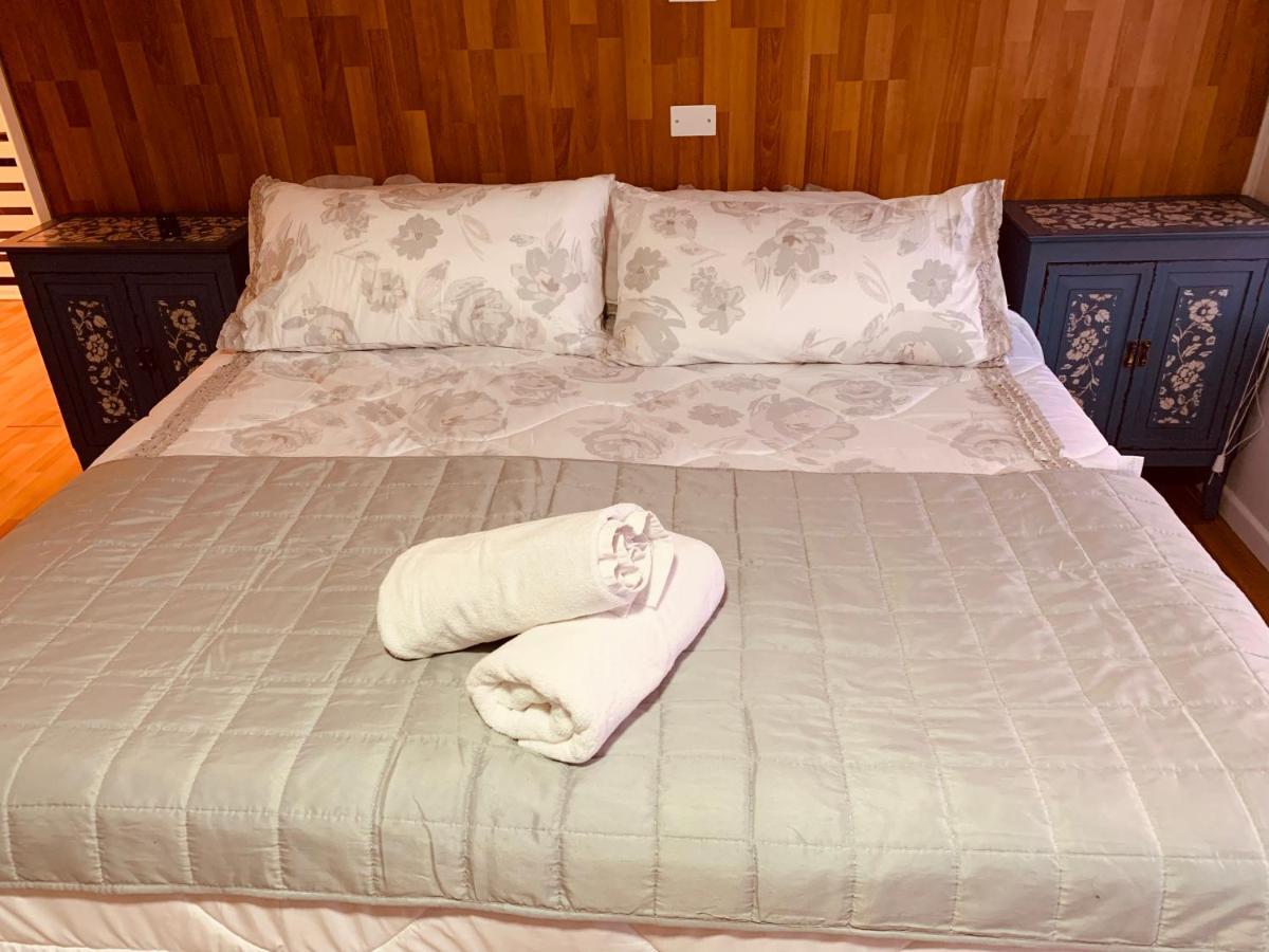 Arte Brisa Hostal Boutique Puerto Natales Bagian luar foto
