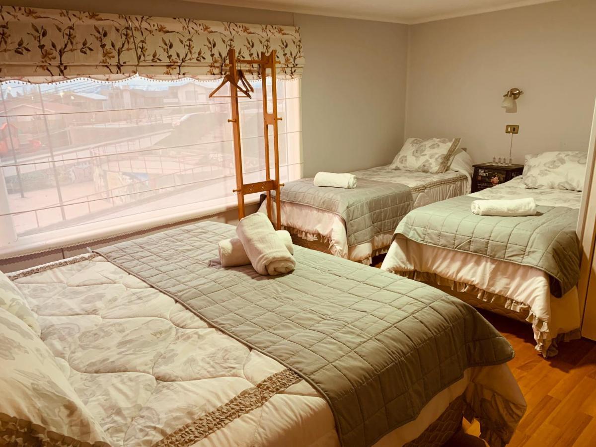 Arte Brisa Hostal Boutique Puerto Natales Bagian luar foto